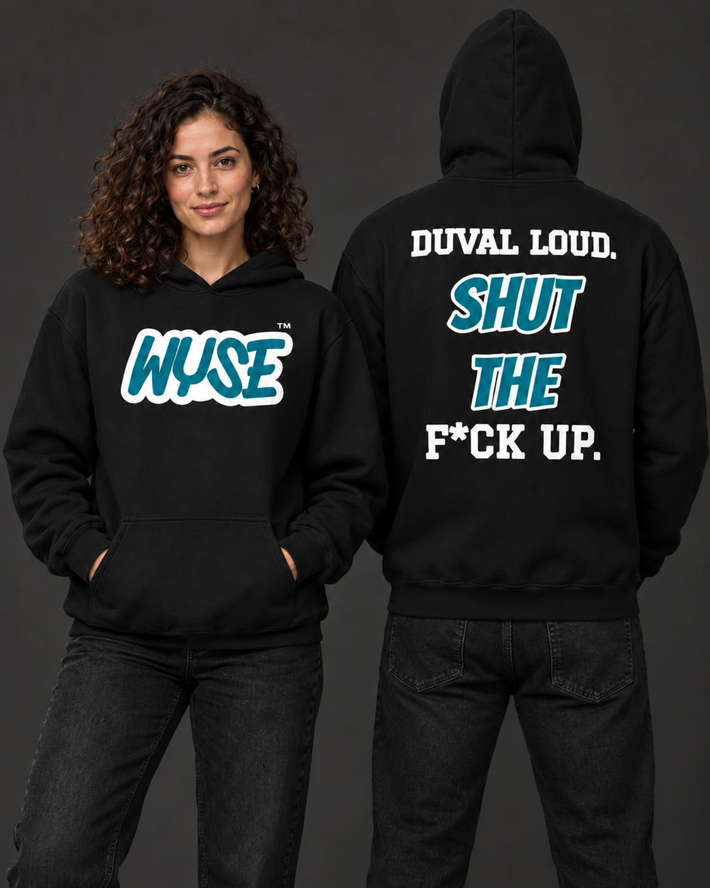 WYSE Jacksonville Jaguars fan hoodie in black, woman front and athletic man facing fully away with teal and white Duval Loud back lettering.
