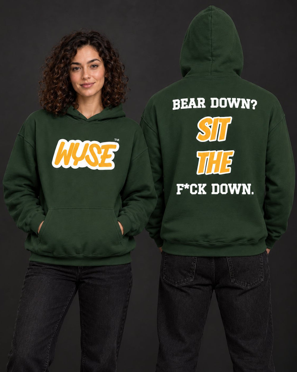 WYSE Green Bay Packers forest green fan hoodie, woman front and athletic man fully facing away with Bear Down Sit the F*ck Down back print.